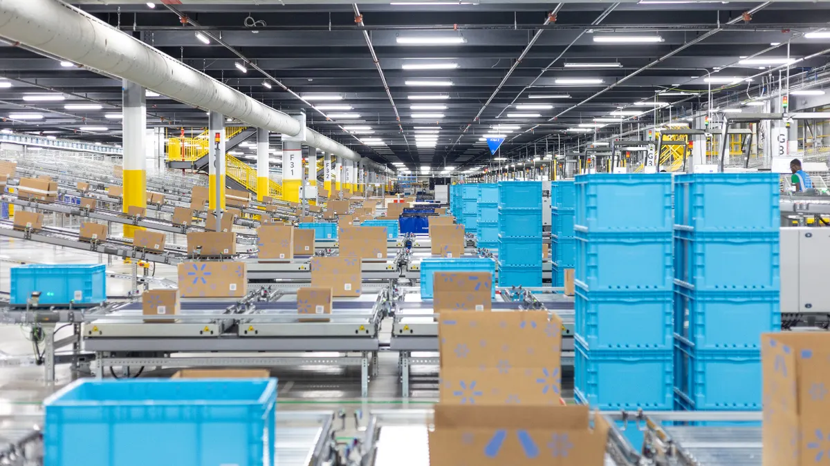 Walmart distribution center with conveyors, pallets, and material handling equipment